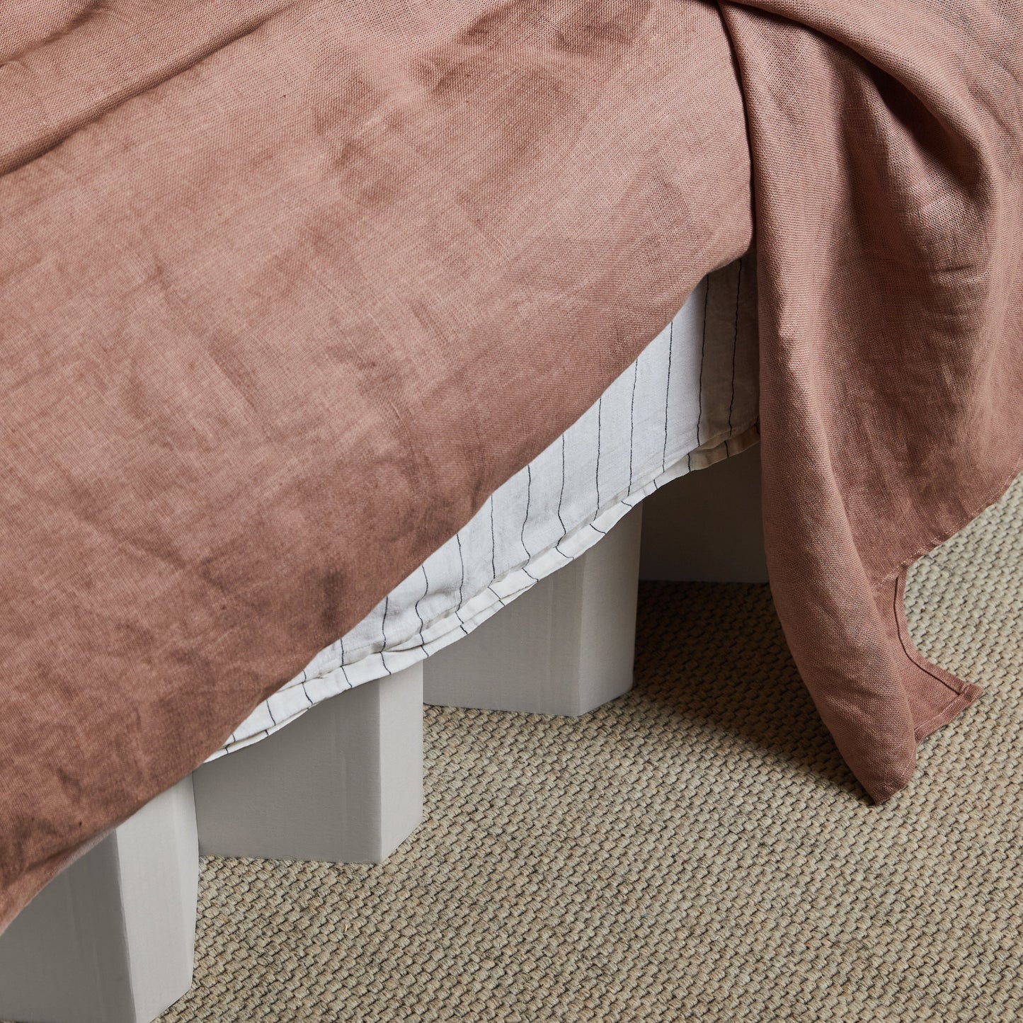 Close-up of Yona Cardboard Bed in white finish