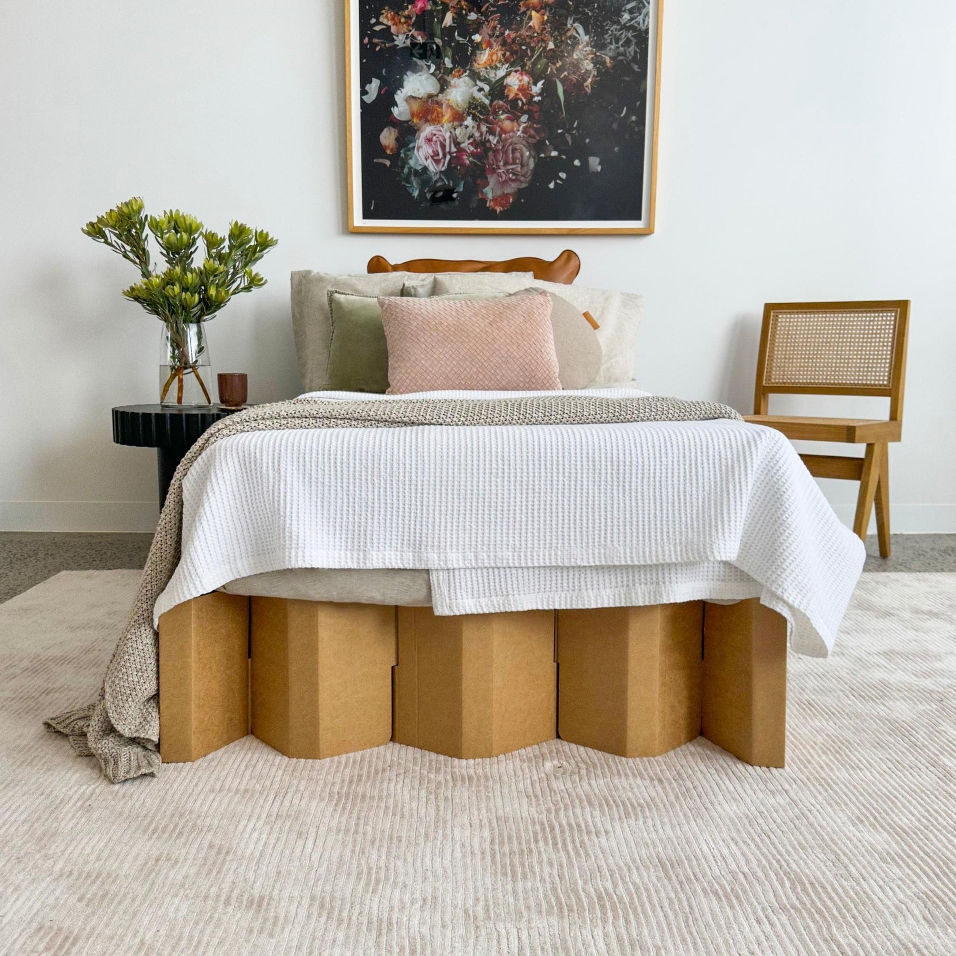 King Single or Single Yona Cardboard Bed in natural finish styled in a contemporary bedroom setup with natural tones